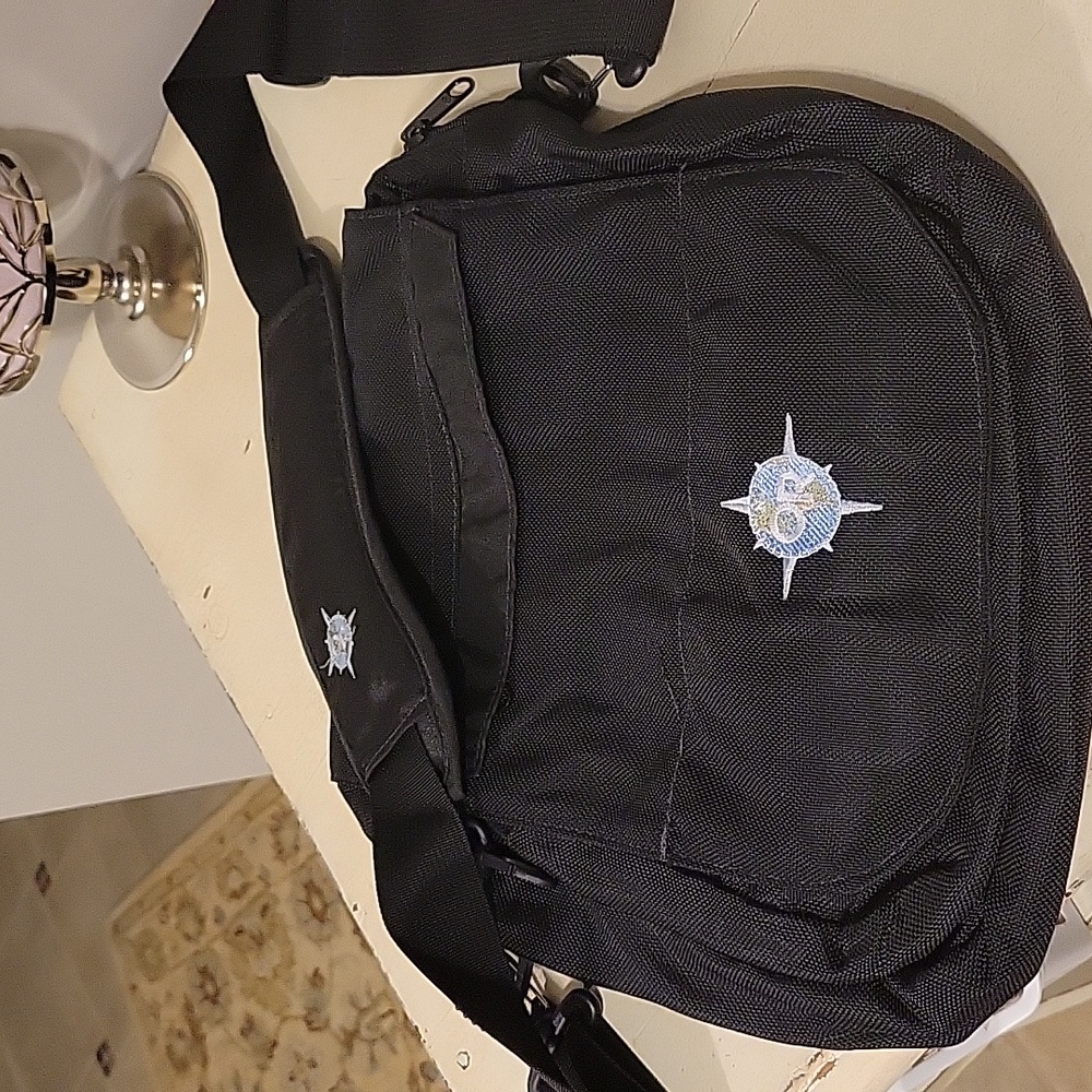 Outdoor Research Shanghai Shoulder Bag. Black ripstop material.